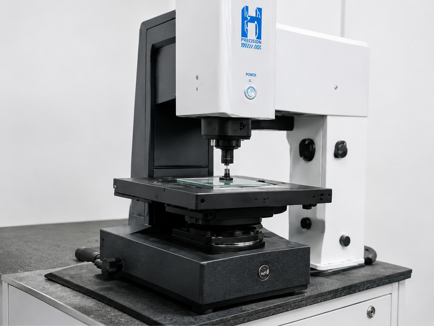 Optical vision measurement system inspecting a precision component